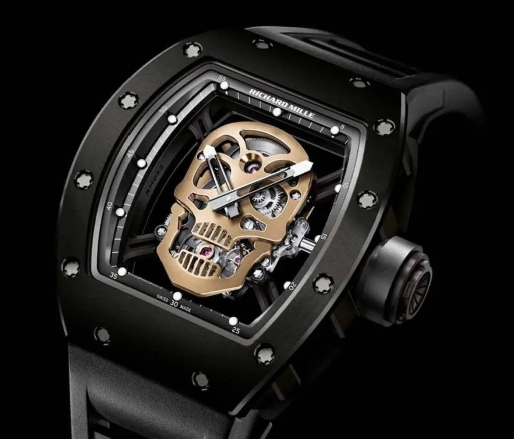 Richard Mille RM 052 Skull replica tourbillon watch with skeleton movement, titanium case, and luxury mechanical design details